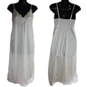 Vintage Contessa 1970's Shiny Semi Sheer Slip with delicate lace trim.